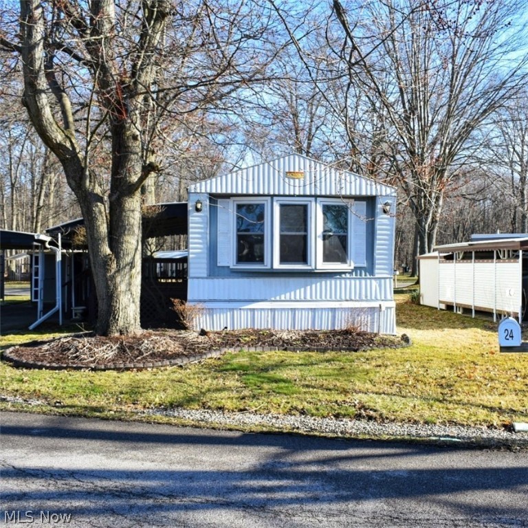 Columbia Park is Ohio's premier adult (55 years and older)leased land community! Amenities include: gatehouse managed entrance 24/7, on site shopping plaza, on site management, walking path/dog walking path, shuffleboard, bocce ball, library, crafts and social hall! Lovely and well maintained 1986 Schult with 2 bedrooms and 1 bathroom. Nice size closet in the master bedroom and great natural light. Located at the end of Grand Drive. Call for a showing today!
