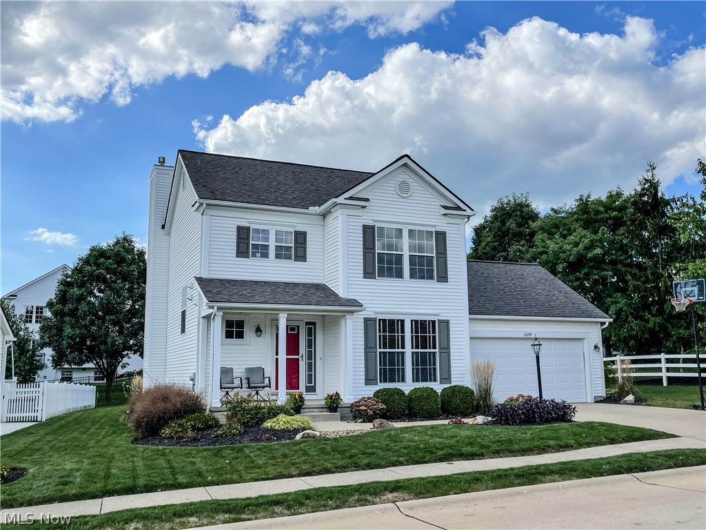 Nestled into this sweet neighborhood, its the perfect location to find this beautifully updated colonial on Darrow Lake. The foyer leads you to a large gathering room that opens to the kitchen, perfect for entertaining. There is an eat-in area as well as a dining room. Upstairs is a spacious owners suite with a huge walk-in closet. Two additional bedrooms and a hall bath round out the second floor. Down to the lower level, you find a large recreation space as well as plenty of storage. There is a newly landscaped patio (2021) to enjoy these quiet fall evenings! Many other updates including: new carpet (2019), fresh neutral paint (2019), New Flooring in dining and great rooms (2016), refinished cabinets (2022) and so much more! Call now to setup your private tour!