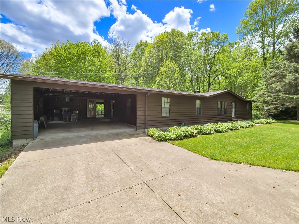 ****** Absolute Auction June 9th  Real Estate sells at 5:30pm********Beautiful Country Setting Features a 34.29 Acre Farm w/good 7 stall horse barn w/hay mow & tack room/office, fenced pastures, open field, spring, pond and wooded land. Country Style Ranch Home having relaxing wood deck (12'x40') w/breath taking views, carpeted floors, living room w/stonefront gas log fireplace, dining area w/built-in hutch, kitchen w/breakfast bar, stove, refrigerator, ss sink, dishwasher and built-in pantry, 3 bedrooms w/ample closets, 2 full baths, and first floor laundry. Full walk-out basement, gas hot water heater, forced air gas furnace w/central air, 200 amp electric,  400' drilled well  and attached 2 car garage. Also a 50'x70'x20' metal steel truss insulated building w/ 3-14' overhead doors, restroom w/shower & mini office, unlimited gas heat, presently mechanic's garage. Also a 30'x70' machinery barn. Also a mobile home w/addtion and basement. Gas well provides unlimited free gas. Current ha