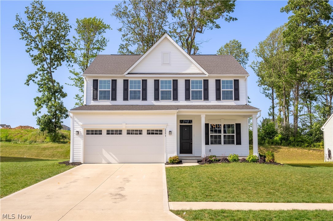 Welcome home to 2293 Monaco St NW in Lake LSD! Built in 2023, this beautifully maintained 4-bedroom, 3.5-bath home offers the peace of mind that comes with newer construction—allowing you to enjoy modern living with minimal maintenance for years to come. Step inside to an inviting open-concept floor plan featuring durable luxury vinyl plank flooring throughout the main living areas, providing both a stylish look and easy maintenance for everyday living. The spacious family room is anchored by a cozy gas fireplace with a striking dark stone surround, creating the perfect gathering space for family and friends. Recessed lighting throughout the home enhances the bright, modern feel, while matte black lighting fixtures in the main living areas and matte black hardware throughout add a timeless designer touch. The kitchen is truly the heart of the home, boasting a massive center island with beautiful quartz countertops, soft-close cabinetry, ample storage, and a full suite of stainless steel appliances that convey—making this home completely move-in ready. Upstairs, you'll find generously sized bedrooms designed with comfort in mind. The finished lower level provides additional living space complete with a full bathroom, making it ideal for a recreation room, guest suite, home office, or fitness area. Throughout the home, thoughtful finishes continue with soft-close cabinets, matte black hardware, and chrome fixtures in each bathroom for a clean, polished look. Outside, relax on the welcoming front porch or entertain guests on the rear patio. Conveniently located in the Lake Local School District and just minutes from Downtown Hartville, you'll enjoy easy access to local restaurants, shopping, parks, and everyday amenities. If you're looking for the benefits of newer construction without the wait to build, this exceptionally maintained home offers modern upgraded finishes, functional living spaces, and quality craftsmanship throughout. This is one you won't want to miss!
