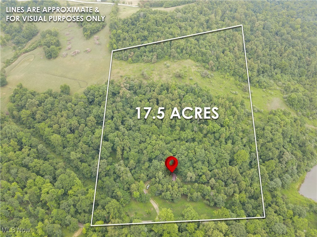 Located on Jacks Run Road in Quaker City, Ohio, this 17.5-acre property is perfect for those seeking a secluded hunting getaway. Situated on a quiet, lightly traveled road, the property is easily accessible via a gravel driveway. Near the front, you'll find a 640-square-foot cabin with great potential. The cabin is wired for electricity, has water from a developed spring, and is heated by a wood stove. With some renovation, it could become an ideal hunting retreat. The mostly wooded property features a clearing with a gas line easement, perfect for planting a food plot and setting up a hunting blind. The woods are also very thick is areas, creating bedding areas to hold whitetail. Additionally, trails wind throughout the property, making it easy to navigate.