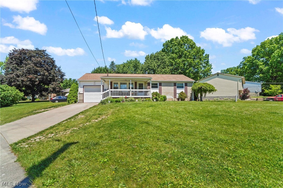 Welcome to this cozy ranch home in Girard! The quiet neighborhood offers well maintained homes and tree lined streets. Pull your car on to the concrete driveway and step up the the covered front porch with a perfect view of the front yard and the neighborhood where you can enjoy grilling or just a morning cup of coffee. Inside the front door is the living room with plenty of natural light. Close by is the updated eat-in kitchen featuring white cabinets and plenty of storage. From the kitchen is access to the one car garage and the basement. Down the hall you will find 3 bedrooms, one featuring its own private half bath and al full bath in the hall way.  The two additional bedrooms offer flexibility for family, guests, or a home office. 
The basement offers quiet space for a man cave and has been used as an additional living area. It features a laundry area and a bathroom that includes a sink, toilet and shower. 
Outside, enjoy a generous yard with plenty of room for outdoor activities, gardening, and includes a shed for additional storage. Located on a quiet street in a desirable neighborhood, this home offers easy access to schools, parks, shopping, and major routes.
Whether you're a first-time buyer or looking to downsize, this lovely home is one you won't want to miss. Schedule your private showing today.