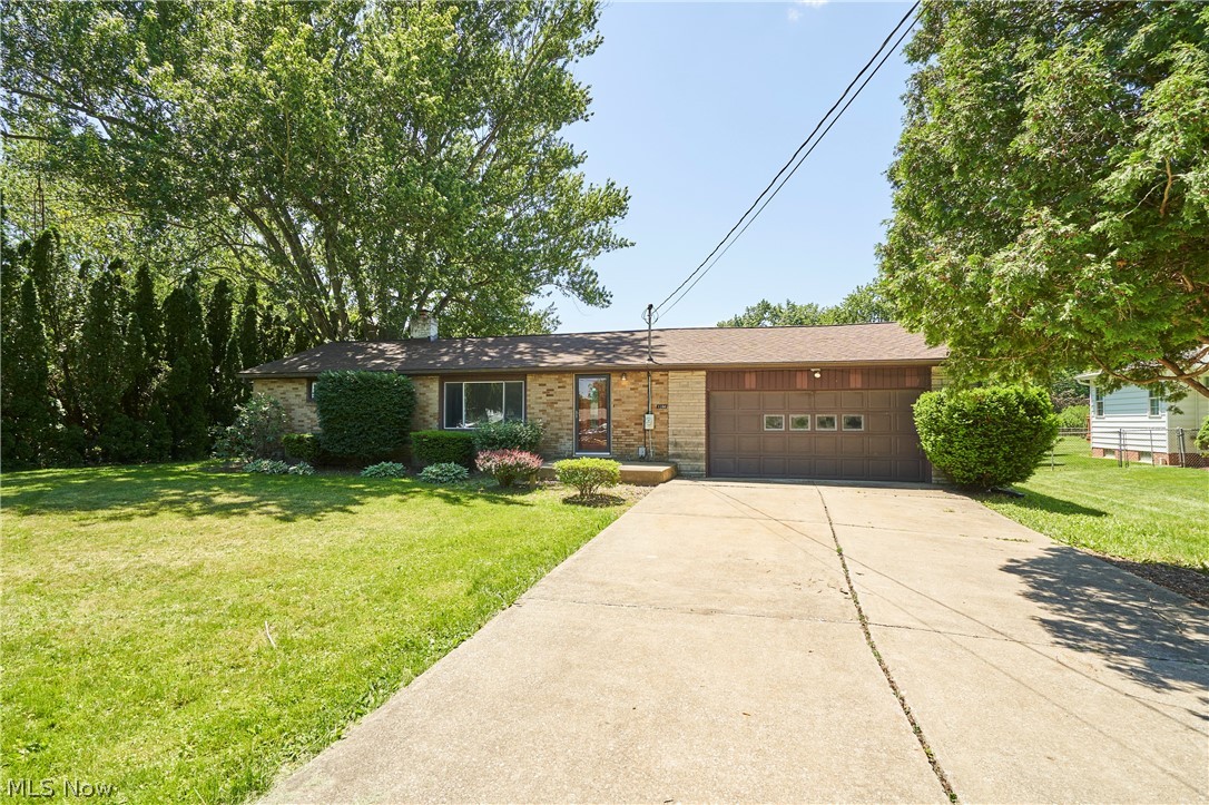 Welcome to peaceful country living with nearly an acre of land! Situated on 0.97 acres, this well-maintained 3-bedroom ranch offers the convenience of one-floor living with plenty of space both inside and out. Step into the bright, spacious living room, featuring updated flooring and abundant natural light. The kitchen offers ample cabinet and counter space and opens to the dining area, making everyday living and entertaining a breeze. The standout feature of this home is the expansive family room addition, complete with a vaulted ceiling, exposed beams, a cozy gas fireplace, and a convenient half bathroom, creating the perfect gathering space year-round. Sliding door access leads to the backyard, where you’ll enjoy nearly an acre of outdoor space with room to garden, play, or simply relax. The home also includes three comfortable bedrooms, an attached garage, and a full basement offering additional storage and potential living space. With its desirable ranch layout, spacious family room, and large lot, this property provides the perfect blend of comfort, character, and outdoor enjoyment