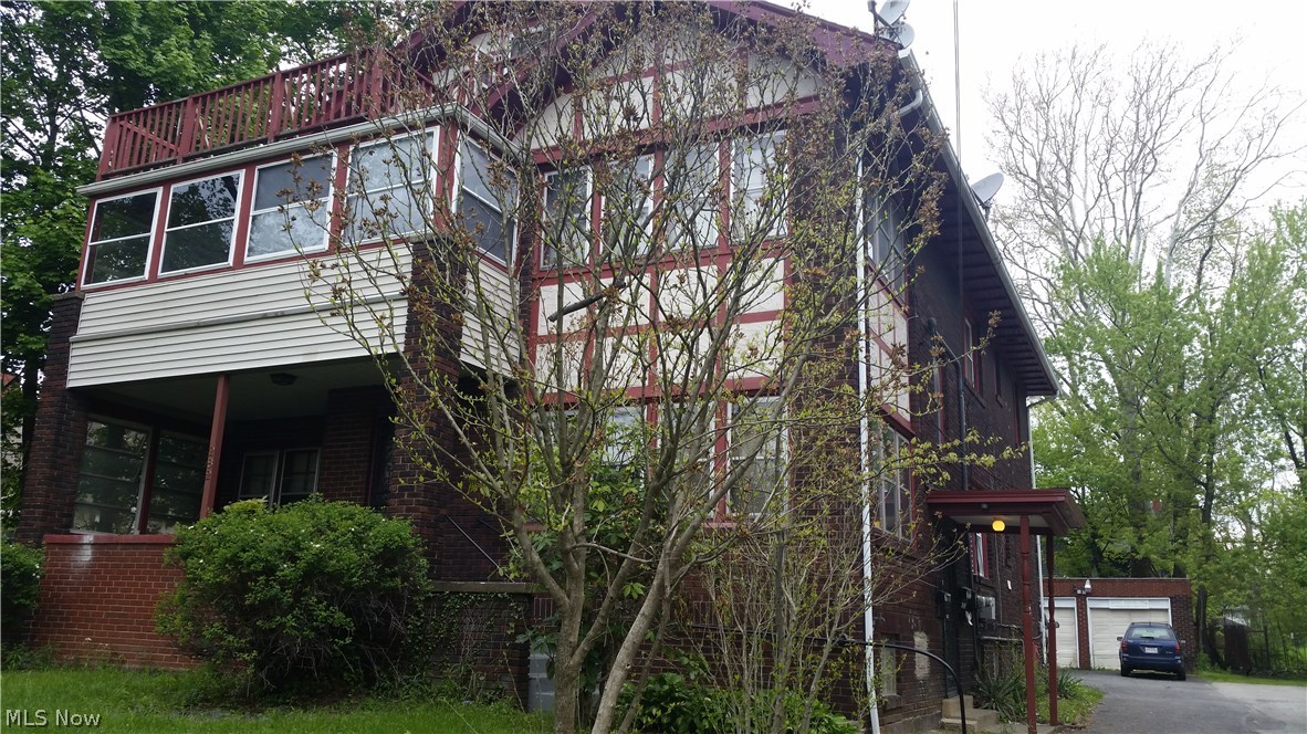 Wow! First Mansion at corner of Fifth Ave. and Fairgreen! This fine Victorian Manor is currently a four Plex. Originally built in 1915 as a spectacular home! Four unit brick multi-family. Wonderful view, close to YSU and hospitals. Spacious, old charm, lots of great architecture. Built-in china cupboards and bookcases. Original woodwork in most rooms; hardwood floors under carpets. Three & 4 bedroom, Formal dinning room & living room with fireplace 1st and 2nd flrs. Front porch and balcony; 3rd floor two bedrooms and outstanding balcony. Basement one bedroom. Good investment Charming first floor sunroom overlooking rear yard.. Ask for details and what is included. Super well designed and in excellent condition. Seller just renovated 2 units, cleaned gutters and had roof inspected and replaced 5 years ago. . Security system ,2  newer Boilers 5 yrs. old, updated electric throughout. Financial info. available to qualified Buyer! Great Cash Flow, Owner pays all gas, electric and water/sewe