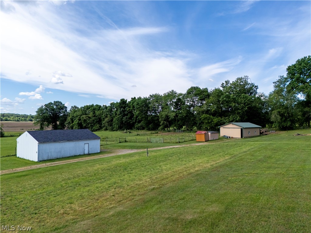 REAL ESTATE:   What a great rural auction opportunity just 2.3 miles north of Marshallville. The property has had great care and are in move in condition. The main house (11018 N Mt Eaton Rd) was built in 1960 by the Geiser’s and added onto making it a 4-bedroom w/ approx. 1,792 sq. ft. of living space. Home has a large kitchen/dining room w/ lots of cupboards, living room, 4-bedrooms & full bath w/ laundry on main floor. Lower level has a walk-out entrance from the family room (w/ fireplace), ½ bath and interesting single width 3-car garage that could be used for many purposes. Taxes are $2,008.02 per year with the Homestead Exemption   The second ranch home (10998 N Mt Eaton Rd) was used as a rental and is a 2-bedroom w/ great hardwood floors throughout the entire home. It has approx. 1,120 sq. ft. w/ kitchen, dining room, 2 bedrooms, and full bath on main floor. Home has a full unfurnished basement. Taxes on this house are $1,625.98 per year. Both homes have their own well & septic.

The adjacent 5.3 acres will be offered in 2 parcels. The southern portion is a vacant parcel approx. 3.1 acres in size. The parcel with the pole barn and horse barn is 2.2 acres. We will offer some combinations of certain parcels and sell what generates the most. 

TERMS: There is No Buyer’s Premium! We require a non-refundable down payment of 10% of the final bid price due the day of auction with the balance due at closing in approx. 30 days. Sellers will split the cost of an owner’s title insurance policy.   Announcements sale day take precedence over printed material.