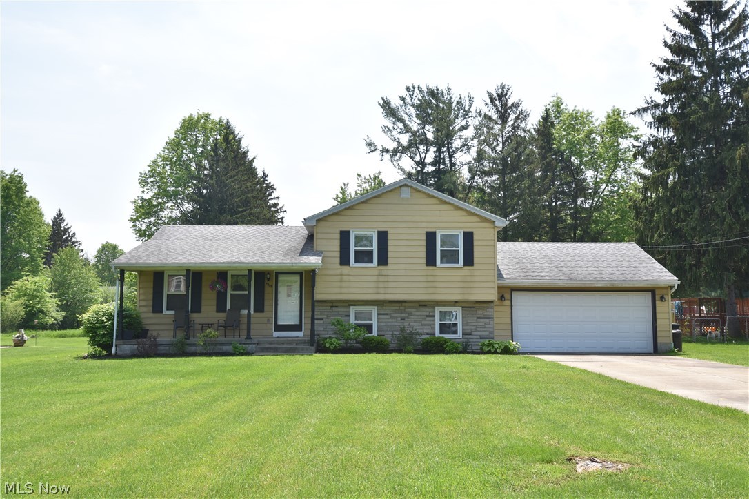 Live the life you love in this contemporary 3 bedroom 1 & 1/2 bath 4 LEVEL SPLIT!  Newer laminate flooring adds to the warmth and charm of this lovely home.  With a living room, family room and rec room there is plenty of room to spread out!  The finished room in the basement can be used as a rec room or a 4th bedroom.   Situated on over 1/3 acre tucked away on a dead end street this home is sure to please!  MAKE A SPLASH!  Family and friends will delight in the above ground pool with fenced backyard, big enough for soccer, wifflle ball, volleyball, bocce, etc.  Enjoy lazy summer afternoons sipping lemonade on the large back deck.  Call for a private showing.