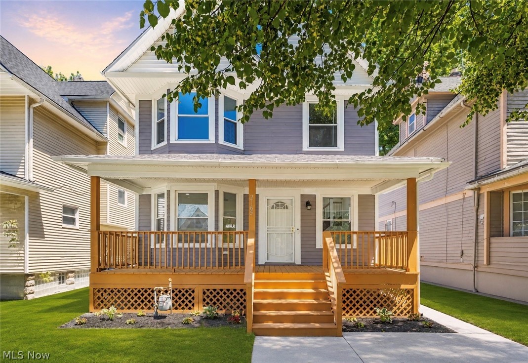 2165 W 95th St is the definition of turnkey living. Completely renovated from top to bottom in 2026, this impressive 5 bedroom, 3.5 bathroom home blends timeless architectural charm with modern updates, creating a move-in ready opportunity just minutes from the heart of Cleveland. Nearly every surface has been refreshed, including updated electrical & plumbing, new drywall, new windows & doors, new LVP flooring, refinished hardwood floors, a new electric fireplace, new appliances, a new garage, & more. A covered front porch welcomes you inside, where the spacious living room immediately captures your attention with abundant natural light, a stunning staircase, & a cozy electric fireplace. The formal dining room flows seamlessly from the living room into the kitchen, creating an ideal layout for entertaining & everyday living. The beautifully updated kitchen is equipped with stone countertops, stainless steel appliances, ample cabinetry, & generous prep space, offering both style & functionality. The 2nd floor is home to 3 spacious bedrooms, including the primary suite featuring a sitting area & its own ensuite bathroom with double sinks. A beautifully refinished balcony extends from one of the bedrooms & an additional full bathroom is also conveniently located on this level. The 3rd floor adds exceptional flexibility with 2 additional bedrooms & a 3rd full bathroom, making it perfect for guests, a home office, or hobby space. The partially finished basement offers even more usable space, featuring classic wood paneling, a half bathroom, laundry area with Samsung washer & dryer, & plenty of room for storage or future expansion. Waterproofing improvements have also been completed. Outside, a detached 2 car garage & fully fenced yard completes the property. Combining historic character, generous living space, & extensive 2026 renovations, this home offers the rare opportunity to enjoy the charm of a classic Cleveland residence without sacrificing modern convenience.