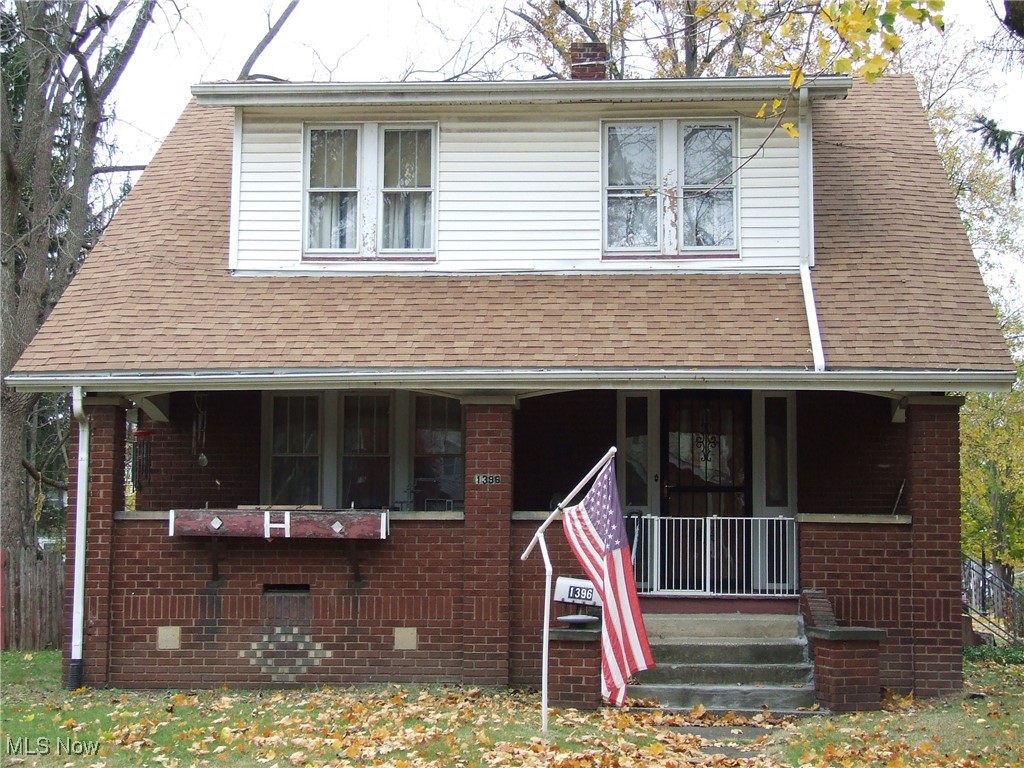 Charming 4-bedroom Brick, center hall Colonial with a lot of its original charm maintained by the same owner for the last 50 years!  Hardwood floor under carpet in the living room and in the 4 bedrooms.  Living room has beautiful, extra wide oak front door, original natural oak woodwork and crown molding, stone fireplace with built-in desk on one side and glass-door bookshelves on the other side, also an original chandelier with co-ordinating ones in the bedrooms.  Newer LVT in dining room along with window seat with drawers.  The kitchen has an original actual farmhouse sink that could use some work and original farmhouse style 2-tone cupboards with original hardware pulls.  There's even a "murphy-style" table and bench that pulls down out of the wall!  Outside still has the old milk box for delivery and the coal chute.  Homey front porch to watch the traffic go by.  There's a 2-car garage attached by a breezeway that also leads to the fenced backyard with small patio and shed.