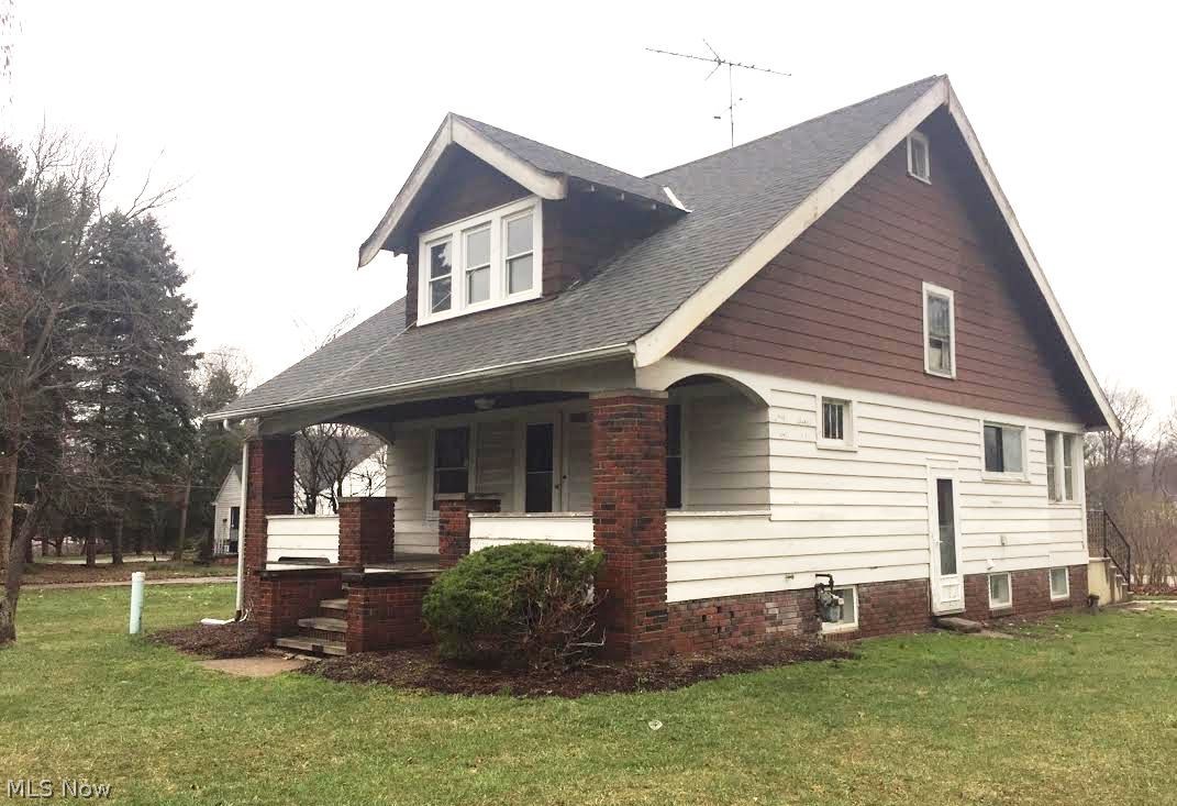 Vintage Cape style home features original woodwork along with its original character and charm.  Hardwood floors, fireplace and built-ins complete the first floor.  Three Bedrooms and one and one half baths.  Full basement with utility area.  The yard is very deep and offers great possibilities.  Located close to Metropark.   Unique home waiting for a new owner to restore it to its former glory!!  This is a Fannie Mae Homepath property.  All information is approximate