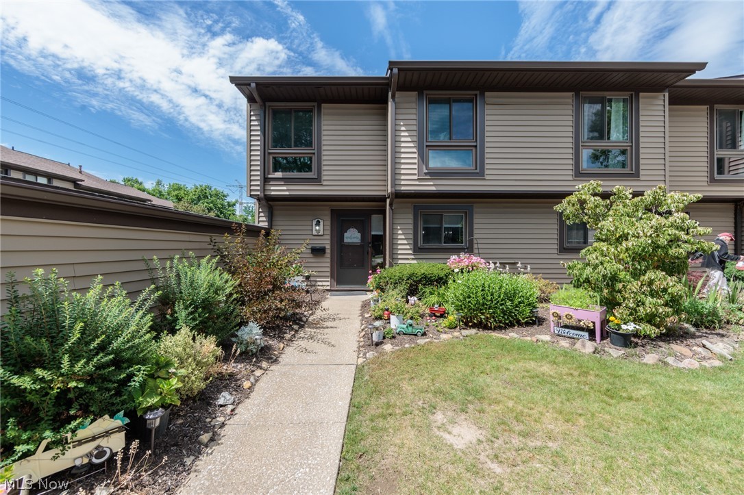 Extensively renovated from top to bottom, this stylish 3-bedroom, 2.5-bath townhouse-style condo in the sought-after Juniper Hill community delivers 1,496 square feet of move-in-ready living with virtually everything updated and new. The open-concept main level impresses with a gas fireplace anchoring the spacious 21x12 living room, fresh laminate flooring, a beautifully refreshed kitchen featuring sage green cabinetry, stainless appliances, breakfast bar, and smart thermostat — all tied together with a welcoming layout that flows effortlessly to the dining area and rear patio. Upstairs, three generously sized bedrooms include a 14x14 primary suite, while the updated bathrooms showcase designer finishes and barn door details that carry the home's modern farmhouse aesthetic throughout. In-unit laundry and a detached garage round out the everyday conveniences. Set within a peaceful, tree-lined community, Juniper Hill offers an exceptional amenity package — a resort-style pool, tennis courts, exercise room, playground, and scenic pond — all maintained through the association, so your weekends stay your own. The location is equally impressive, with quick access to both Akron and Cleveland, abundant shopping, dining, and the Towpath Trail just nearby for outdoor recreation. Whether you're looking for a low-maintenance primary residence or a turnkey retreat, this one is ready to deliver.