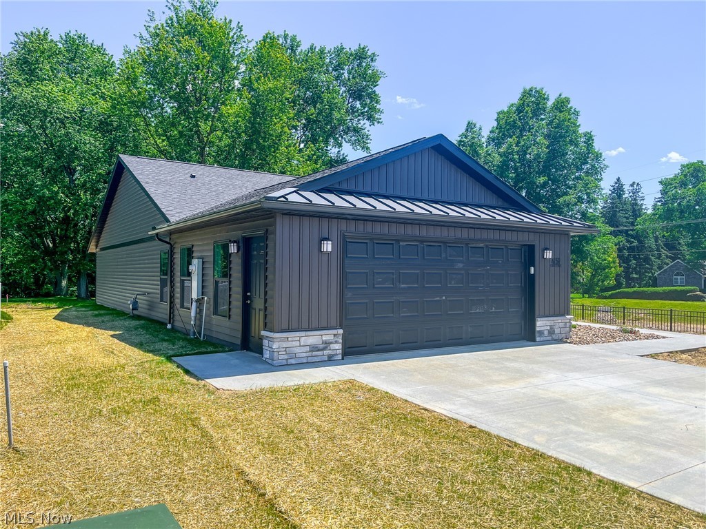 Welcome to Oasis of Wooster, a thoughtfully designed allotment featuring 19 new construction homes where modern design meets energy efficiency. These 3-bedroom, 2-bathroom homes offer 1,633 sq. ft. of living space, complete with an attached 2-car garage and a spacious concrete patio. Each Energy Star Certified home is built to ensure low heating and cooling costs while maximizing comfort year-round. Step inside to discover a functional open floor plan. The kitchen, a centerpiece of the home, boasts ample cabinet storage, a center island with granite countertops, and plenty of space for cooking and entertaining. The kitchen seamlessly connects to the dining area, creating an inviting setting for meals and gatherings. Adjacent to the dining space, the bright living room is filled with natural light from large windows and a sliding glass door that opens to the patio. The home’s three bedrooms include a serene master suite featuring a walk-in closet with abundant shelving and an en-suite bathroom with a double vanity. Designed with convenience in mind, these homes offer first-floor laundry and no basement. Lofted ceilings in the kitchen and dining areas enhance the sense of openness and modernity, making each home feel spacious and inviting.
