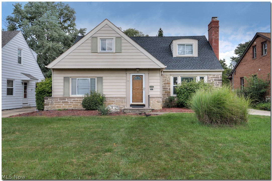 Welcome home to 14459 Washington. Lovely Cape Cod style home situated on a fenced lot with detached 2 car garage. 2 bedrooms on the first floor, and 2 bedrooms on the second floor make the layout attractive and flexible. Lovely living room and dining room feature fireplace and mantle. Sun room overlooks backyard, and the swingset stays! Hardwood floors throughout. A great home in a great neighborhood close to all University Heights has to offer - shopping, dining, convenient highway access, and much more! Home will be POS violation free at time of title transfer.