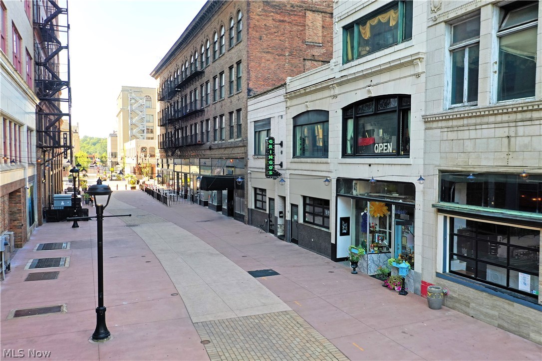 Seize the turn-key potential of this established Youngstown business! Recently closed but available for near-instant
reinstatement, this building puts you in the heart of downtown’s bustling restaurant district. With construction now
finalized, this scenic local sits in the hottest corridor, Phelps Street. With foot traffic only and the opportunity to take
advantage of large crowds and gatherings, the two-story structure keeps you front and center. Formerly “Gringos”, a
Mexican cantina and taco bar; the first-floor atmosphere is visually engaging, full of sleek updates and desirable features
such as full-length bar, touch tunes jukebox, a full draft and craft drink expo area, fountain soft drinks and more! Two
separate dining areas include colorfully appointed restrooms and great streetside views. A professionally equipped
kitchen provides a large flattop, dual fry stations and industrial range. Multiple cold prep stations offset twin refrigerator
units as the dishwashing apparatus completes the ensemble. At the basement level, an oversized walk-in cooler joins both
an ice machine and c02 systems for the drinks. The second floor finds office space with a full bath, lounge area and
impressive storage or potential apartment space. Bar comes with a D-5 liquor license. Call today for more information!
