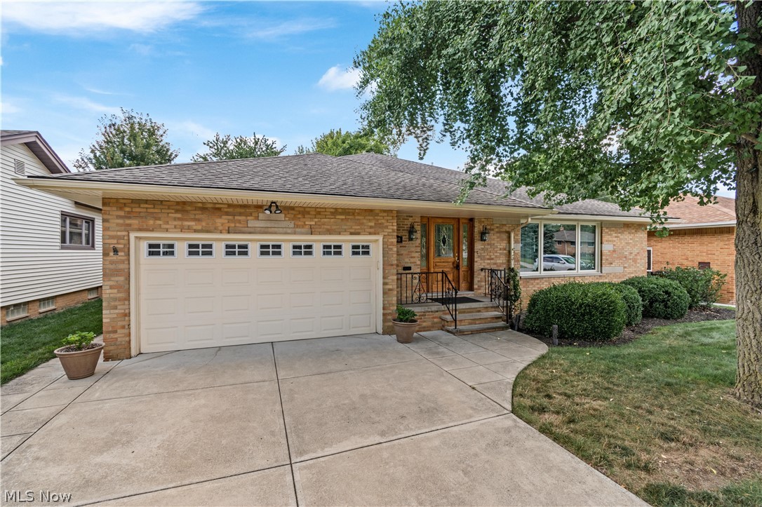This is the home you've been waiting for! This all brick 3 bedroom ranch has over 4000sqft of living space! This unique home has the potential of becoming a 2 story! Large, extra-wide solid wood staircase leads to double doors that can convert to an expansive master suite or additional living space with ample storage! The foyer leads to the formal living room and dining room with stylings and colors of French Country throughout. Quality craftsmanship and attention to detail is evident in the custom Ethan Allen drapery, solid wood wainscoting and Waterford light fixtures.The spacious eat-in kitchen with newer kitchen appliances leads to a spacious family room with updated gas fireplace and large bay window overlooking the golf course. A second laundry room has been added on the main living level for convenience! Three spacious bedrooms, full and half baths round out the main level. The basement has been fully finished with a full bath and additional laundry room perfect for additional g