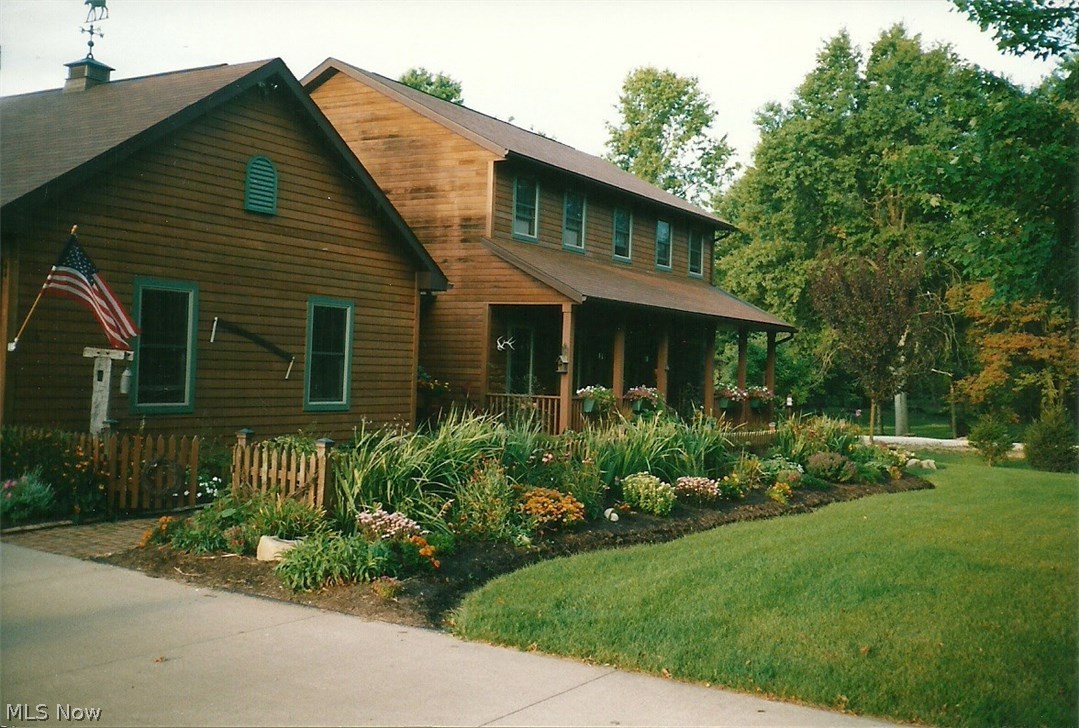 Custom built with quality throughout, this 3 bedroom, 2.5 bath home is a true beauty!  The first floor boasts 9 foot ceilings, an office, laundry and cherry wood floors that accent both the foyer and the formal dining room.  The amazing kitchen offers stainless steel appliances, lovely custom built Amish cherry cabinets, granite counters, a desk area, pantry, and a new vinyl floor.  French doors from the kitchen/dinette lead to the awesome all season sun room with vaulted ceiling and windows galore, including bench w/storage.  Entertainment is easy in the spacious great room or the casual finished rec room.  All baths offer Amish, custom built, solid hickory wood vanities.  The master suite features a walk-in closet w/organizer and master bath with granite, walk-in shower and Jacuzzi tub.  New carpeting on the 2nd floor, hall & steps.  Outside, you'll find beautiful illuminated landscaping with perennial flowers, stamped concrete patio, Cal Spa 7 person hot tub to enjoy the stars, barn