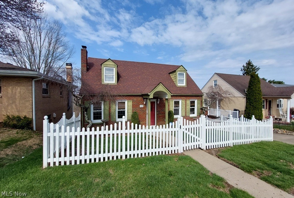 This charming 1½-story brick Cape Cod home offers the perfect blend of classic character and functional living space. Featuring 4 bedrooms and 2 full bathrooms, with one bath conveniently located on each floor, the layout provides flexibility for a variety of lifestyles. The home includes a 90% finished basement complete with a full second kitchen and a spacious rec room, making it ideal for entertaining, extended living, or guest accommodations. Laundry is currently located in the basement, with additional hookups available in the front bedroom or office on the main floor for added convenience. Enjoy outdoor living with a rear screened-in porch that overlooks a large deck, perfect for relaxing or hosting gatherings. For added peace of mind, the home is equipped with a natural gas generator capable of powering the entire house during outages. Updated roof approx. 12 years old and furnace 4 years. This well-maintained home offers space, versatility, and timeless appeal—ready for its next owner to move in and make it their own.