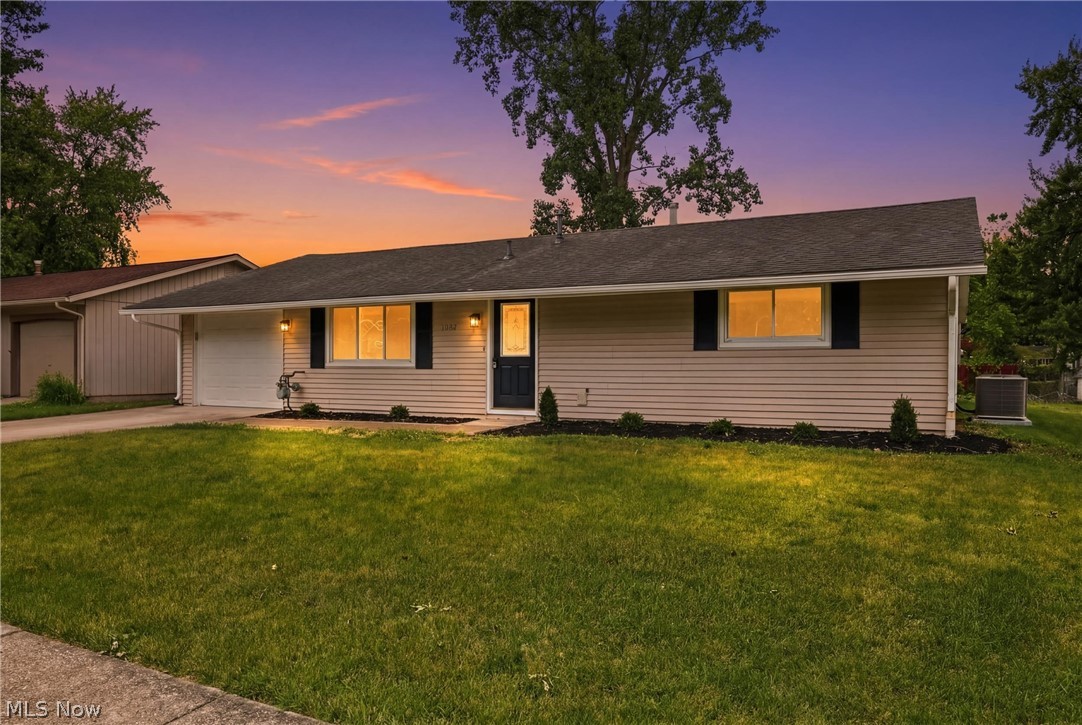 Welcome home to this thoughtfully designed 4-bedroom ranch in a desirable Grafton neighborhood. Offering the convenience of one-floor living and a layout that provides both togetherness and privacy, this home is ready for its next chapter. The spacious owner’s suite is tucked away from the other bedrooms, creating a private retreat with French doors and an en-suite bathroom. On the opposite side of the home, 3 additional bedrooms share a full bath, making the floor plan ideal for families, guests, or a home office. At the heart of the home, the beautifully renovated kitchen features quartz countertops, new cabinetry, and a charming peekaboo opening into the dining area, allowing conversations and gatherings to flow effortlessly. The open layout is perfect for everyday living and entertaining alike. A real wood-burning fireplace adds warmth and character, while both a living room and family room provide the flexibility today’s buyers are looking for, offering separate spaces to relax, entertain, work, or play. Outside, you’ll appreciate the low-maintenance backyard, newer storage shed, and tandem garage with dedicated workshop space. Together, these areas provide excellent flexibility for hobbies, projects, outdoor equipment, seasonal storage, and all the extras that need a place to call home. With a fully renovated interior, new HVAC system, newer windows, and a brand-new kitchen, this move-in-ready home allows you to spend less time on projects and more time enjoying everything Grafton has to offer. Thoughtfully updated. Wonderfully laid out. Ready for its next owner.