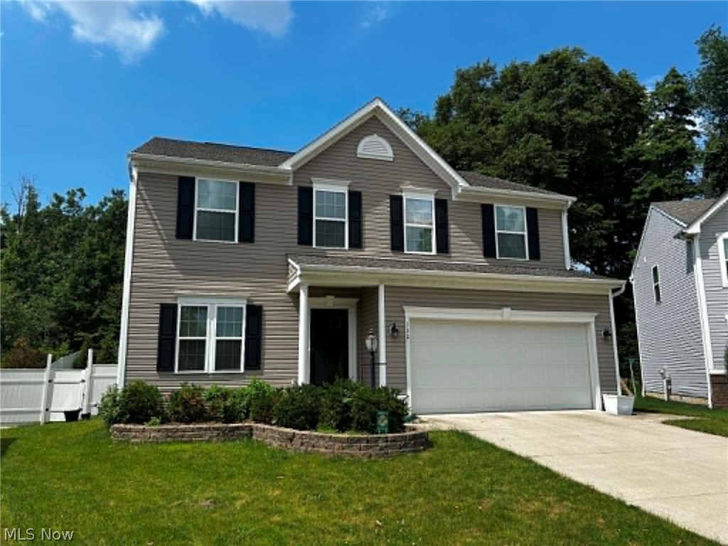 Tucked Away on a Quiet Cul-de-Sac | 2,708 Sq. Ft. of Luxury Living with Your Own Private Backyard Oasis

Welcome to this beautifully maintained 2016-built home in the highly sought-after Tallmadge City School District. Designed for both everyday living and entertaining, this 4-bedroom, 2½-bath home offers modern finishes and exceptional indoor-outdoor living.

The open-concept main level features 42-inch cabinetry, abundant counter space, a large center island with seating, gorgeous hardwood floors, and a spacious great room with built-in surround sound. A sun-filled breakfast nook surrounded by oversized windows, along with the expansive deck added in 2019, provides the perfect place to enjoy your morning coffee while overlooking one of the home's most impressive features—a dramatic professionally landscaped multi-tiered waterfall. The spacious backyard is fenced on almost every side, creating the perfect setting for entertaining, recreation, or simply relaxing in your own private retreat.

Upstairs, you'll find four generously sized bedrooms, including an oversized primary suite with a jetted soaking tub, separate shower, dual vanities, and a large walk-in closet. Laundry hookups on both the second floor and in the basement provide added convenience and flexibility.

The partially finished basement offers additional living space and includes a full bathroom already roughed in, making it easy to finish into a guest suite, recreation room, home gym, or additional living area. Additional highlights include recessed lighting, a spacious 2-car attached garage, and an HOA that provides snow removal and maintenance of the common areas.

Thoughtfully designed and meticulously maintained, this exceptional home offers quality craftsmanship, spacious living, and a backyard setting you'll enjoy year-round. Guardian security system is installed and may be transferred to the new owner.
