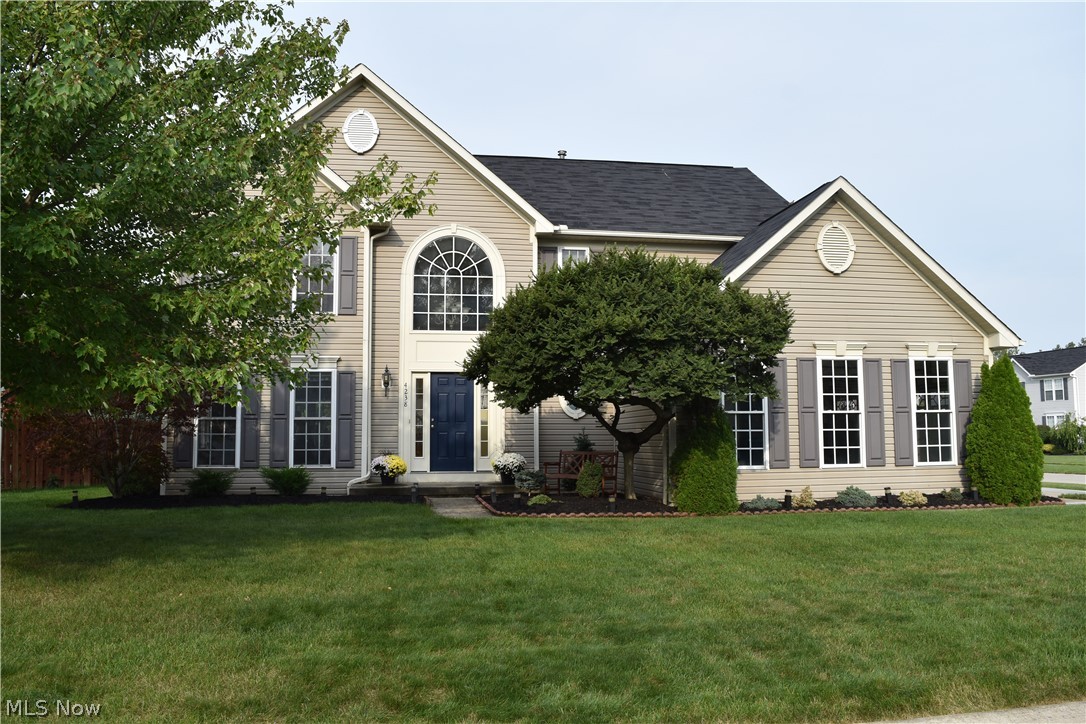 Beautiful Colonial home located in desirable Camden Ridge.  This home features an expansive kitchen that opens up to the family room with fireplace, first-floor laundry, attached two-car garage, and guest powder room.  The formal living & dining room will be a perfect gathering place for your family this holiday season.  The two-story foyer leads upstairs to the large master suite with walk-in closet, and private bathroom with heated floors.  The backyard is beautifully landscaped and has a tree-lined privacy fence, simply imagine yourself relaxing on the stamped patio while bird-watching.  You're invited to make this house your home!