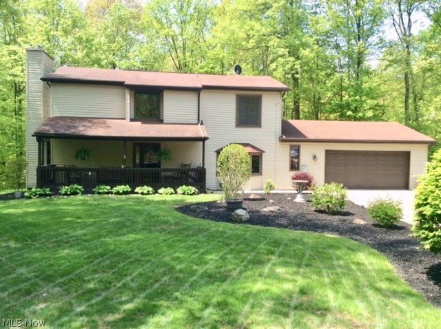 Don't miss this exceptional 4 bedroom 2 full 2 half bath vinyl sided colonial situated on a park like setting on a cul de sac. Applianced kitchen with pantry plus a breakfast bar into the family room.  1st floor laundry. Glass doors off the kitchen to a 3 season sun room with sky lights overlooking the patio and fire pit surrounded by a private wooded area.  Replacement windows & doors.  Siding 2011. Waterproofed finished basement with a ventless gas fireplace and beautiful custom built wet bar great for entertaining.  Includes two bar refrigerators, one that can convert to a freezer. Glass block windows in the basement.  All this and a 13' X 23' workshop attached to the garage for the handyman. Workshop access through the garage or from the outside. Within walking distance to schools. This home is beautifully maintained and shows pride of ownership.