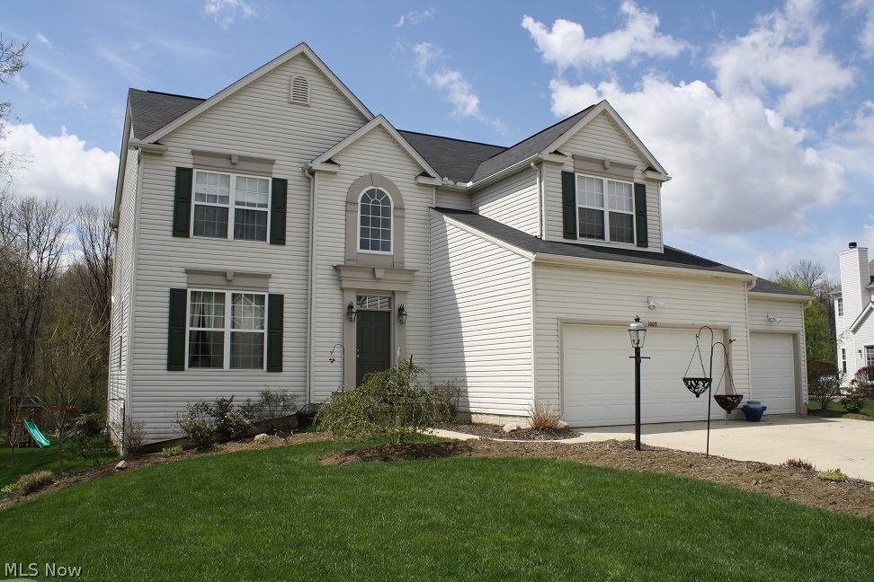 4 Bed 2.5 Bath modern colonial in excellent rated Wadsworth School District. Community features include clubhouse, pool, walking trails, and exercise facility. Lot is next to an unbuildable area and backs to wooded area.  Two story foyer with hardwood floors, trimmed out den/dining room, open floor plan, huge kitchen, with walk-in pantry, and morning room with cathedral ceiling. Step down to cozy family room with fireplace. 9ft ceilings and oversize windows throughout the first floor let in loads of light.  First floor laundry. All bedrooms have walk-in closets, vaulted ceiling in master bed and bath. Huge Timber-Tech deck (20’x25’) off the back with custom built pergola, perfect for entertaining. Three car garage with bonus area for storage or handyman workshop, with instant on light and 20amp outlets for all your power tools. Terrific neighborhood.