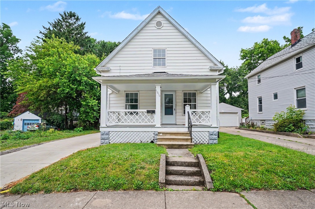 Conveniently located in a quiet neighborhood in North Hill.  This beautiful 3-bedroom, 1 bath colonial offers endless updates on the inside and outside. The new LVP in the kitchen, dining room and living room will not disappoint.  Freshly painted walls and ceilings in the entire home. Exterior updates include freshly painted front porch and back deck; the entire home has been power washed, new roof, new gutters and a new cement driveway were installed in June 2026.  A welcoming front porch invites you inside to the first floor which features a bright and airy main living area + dining room with large windows and a brand-new kitchen with butcher block countertops.  1 bedroom is conveniently located on the 1st floor.  There is a small foyer off the kitchen which leads to the back deck with a wheelchair ramp.  The 2nd floor boasts two large bedrooms with huge closets and storage spaces.  A brand-new full bathroom is between the bedrooms.  The basement has a high efficiency furnace, AC which was installed MAY 2025, new utility sink in basement, hot water tank installed in 2024; glass block windows. Updated double hung windows.  No garage.