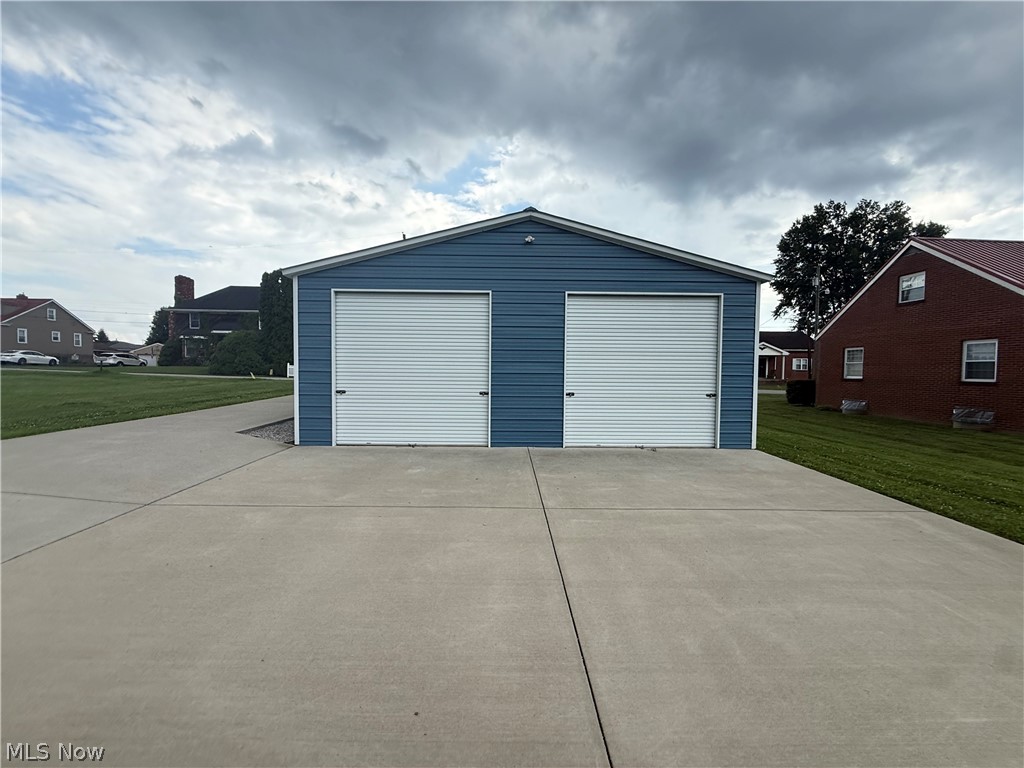 This 30' x 40' garage offers endless possibilities, featuring a solid concrete pad and situated on a nice, flat lot that's ready for your plans. With electric already in place, it's an ideal space for storage, a workshop, hobbies, or future projects. Whether you're looking for extra room for vehicles, equipment, or recreational toys, this property has the foundation to meet your needs. Don't miss this opportunity—call today to schedule your private tour!
