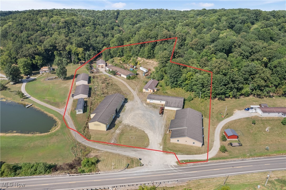 For Sale or Lease – 9569 State Route 39, Sherrodsville
Outstanding commercial opportunity offering over 37,000 sq. ft. of space across 8 buildings, including a 7,250 sq. ft. office/showroom with full utilities (water, sewer, electric, and gas).  The property spans approximately 6.63± acres with excellent frontage and easy access off State Route 39. Conveniently positioned near the Atwood Lake area and centrally located between Carrollton, New Philadelphia, and Cadiz, this site offers prime visibility and accessibility.  Whether you’re looking to purchase the entire property or lease one or more spaces to suit your needs, this versatile property provides endless potential for office, showroom, storage, industrial, or mixed-use purposes.