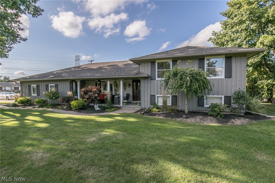 Gorgeous Split Level in Sheffield Twp with amazing yard with lots of love poured into this home! The welcoming front porch is a great place to relax and enjoy some peace and quiet. Open floor plan with gorgeous living room with large bay window which leads to a dining room with plenty of space for formal gatherings!! The eat in Kitchen is the heart of the home and is updated with newer cabinets, flooring and granite counters and opens to the family room with brick fireplace!! The Sun room is light and bright with loads of windows to bring the nature in and space to relax or entertain!! The upstairs Master Suite is a true delight with views of the backyard and master bath with upgraded granite vanity and walk in tile shower! 2 other large bedrooms and a full bath complete the upper level living quarters. The lower level recreation room is great with entertainment and a bar area, fantastic for parties!! An additional room is being used as an office but could also be used for a bedroom, w