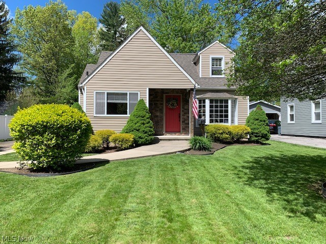 Absolutely amazing and immaculate! If you are looking for a home that won't need any money poured into it, you have found the one.  The lawn and back yard are meticulously landscaped, ready to enjoy an evening outside on the decorative brick patio.  Inside you will find beautiful wood floors thru much of the first floor, and an absolutely amazing finished basement with a full bathroom!  The kitchen is delightfully updated with ceramic tile and has a breakfast nook behind a arched ceiling from the kitchen. Upstairs is a large bedroom with a large walk-in closet.  The entire home is tastefully painted and is truly "move-in ready".  So many newer features come with this beauty...The siding is about 10 years, and the roof about 7-8 years young.  The furnace and air are only about 7-8 years as well!  Visit this home as soon as you can....it truly won't last.