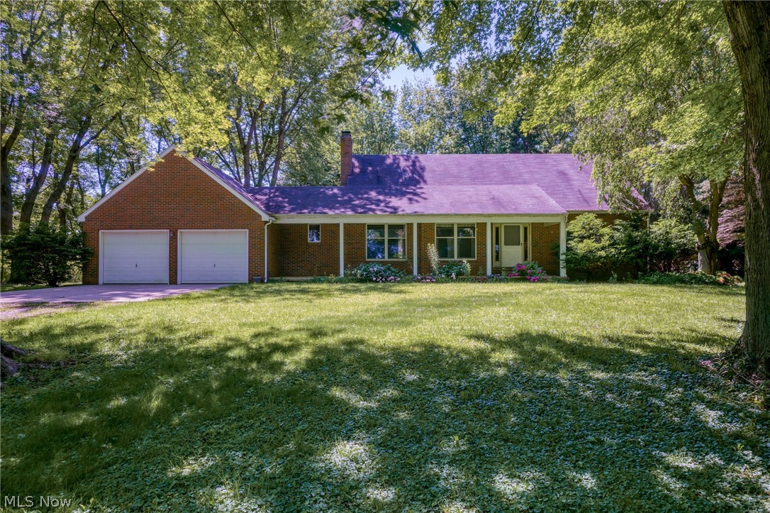 A tree-lined private drive welcomes you to this beautifully maintained all-brick 4-bedroom, 2.5-bath home.
Enjoy over 5 wooded acres featuring a scenic creek and two large barns perfect for storing cars, boats, recreational vehicles, and more.
Designed for comfortable everyday living, the home offers first-floor laundry/mudroom facilities and a spacious first-floor primary suite.
The open kitchen features solid wood cabinetry, a center island, and a cozy breakfast nook that flows seamlessly into the family room, creating an ideal space for entertaining.
Storage is abundant throughout the home, including a full basement with a wood-burning stove capable of heating the first floor during power outages. An additional crawl space with a concrete floor provides even more storage options.
With multiple gathering spaces including a living room, family room, dining room, and basement
there is plenty of room for hosting family and friends.
**furnace new 2024, hot water tank new 2022 & septic pumped out 2026**
Schedule your private tour today and experience this exceptional property for yourself!