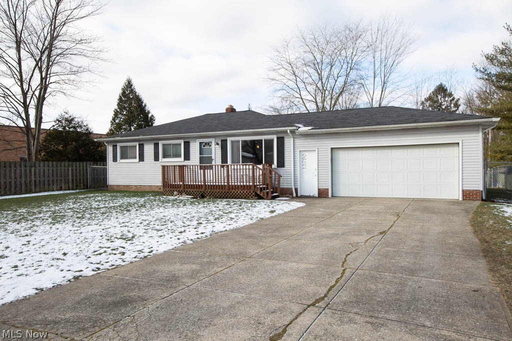 This 3 bedroom, 2 full bath gem, centrally located in Strongsville, is the perfect home for you! As you climb the steps of the front deck, you enter the home & are greeted by the bright, open living room w shining wood floors. The eat-in kitchen allows you to entertain easily while preparing meals with easy access to the seating area & the outdoors. This kitchen has plenty of storage & shelving with updated appliances that stay with the home. The sliding glass doors take you to the large back deck overlooking the square green space of the fully fenced back yard. 10x15 covered concrete patio allows for shady space when you'd like to be shielded from the sun. Bedrooms 2 & 3 are freshly painted & adjacent to the 2nd full bath. Master suite addition adds square footage to this home unlike others in the development.  Follow the hallway to this private suite that has been updated with fresh paint, full bath, walk-in closet w organizers, sitting area/office, and sliding doors leading you to t