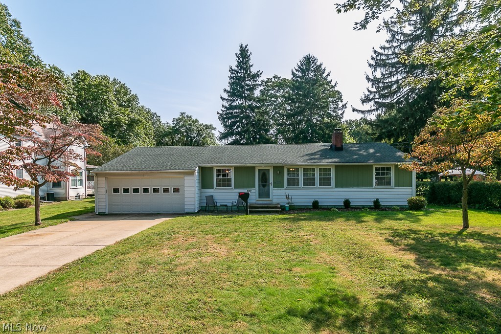Adorable ranch w/full basement. Beautiful new carpet on first floor.  Spacious Living room w/fireplace & built ins. Also includes a large formal dining room and large eat in kitchen.  The private rear fenced back yard is fantastic with views from the roomy sun room/4 season room which could be used for whatever you want:  playroom, office, or just a place in drink your coffee in the morning and enjoy the peaceful setting of your totally private back yard.  Yard includes storage shed. Updated electrical, newer walk-in shower in bath, Hardwood under carpet in living room, dining room & bedrooms.   Great location & easy to see.