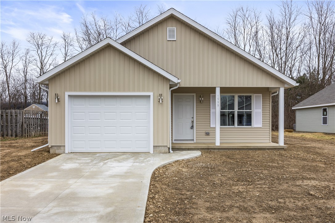 NEW CONSTRUCTION near Lake Erie with MAJOR SAVINGS! Enjoy a 10-year, 75% tax abatement - only 25% of the taxable value is assessed for 10 years, helping significantly reduce property taxes and lower monthly payments - plus NO HOA fee for added value.

Blending modern design with everyday convenience, this one-story home features an open floor plan with a cozy fireplace in the great room and a well-appointed kitchen offering granite countertops, a stainless dishwasher and range, and a sleek wall-mounted range hood. The primary suite includes a private full bath with double sinks, a spacious walk-in closet, and direct access to a covered back patio—ideal for morning coffee or evening relaxation. Additional highlights include an attached garage with a heated utility room, a covered front porch, and thoughtful finishes throughout.

Ideally located just minutes from the beautiful shores of Lake Erie, as well as Cedar Point and Sports Force, offering easy access to waterfront activities, recreation, and local attractions. A great opportunity to enjoy new construction living close to the lake!
