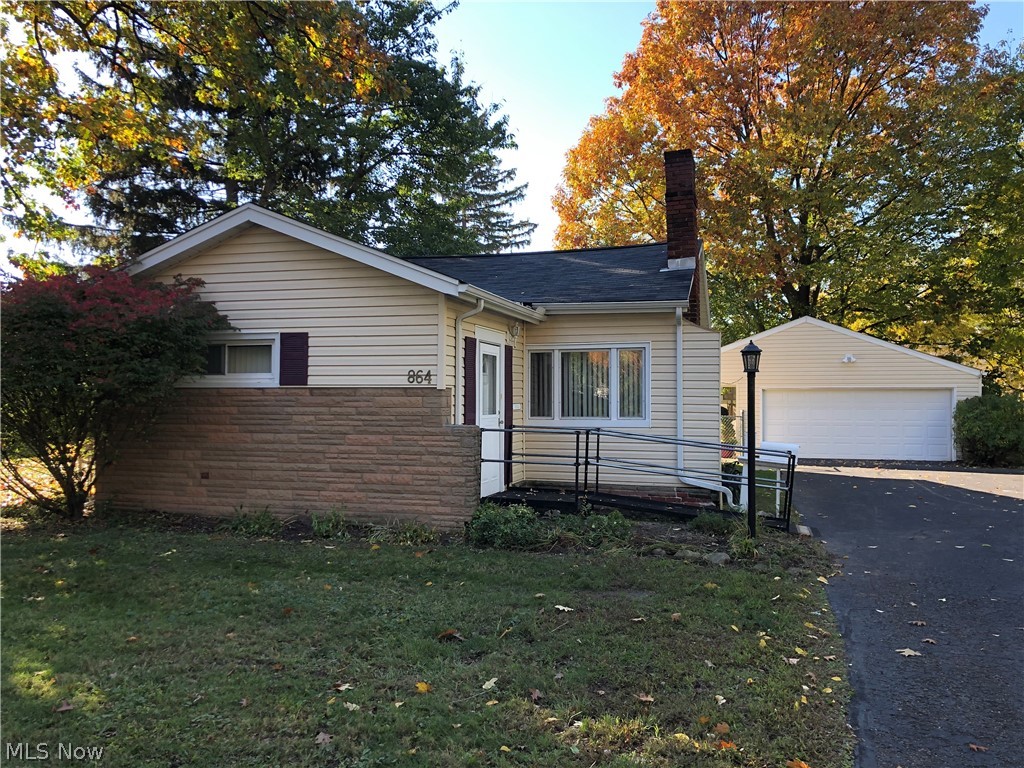 Outstanding opportunity in Willoughby! Home has a great setting on one of the largest lots on the street. Great curb appeal as well! Nice 2+ car garage with an extended roof over the covered patio. Very quaint backyard and a huge side yard with shed.  Two bedrooms, dining room and a nice size living room.  There is also lots of opportunity for somebody that might want to add on to the home and expand it for more space. This is truly a special property so bring your creative decorating ideas and make this into the home of your dreams! A very short distance to Lake Erie and Osborne Park a plus!