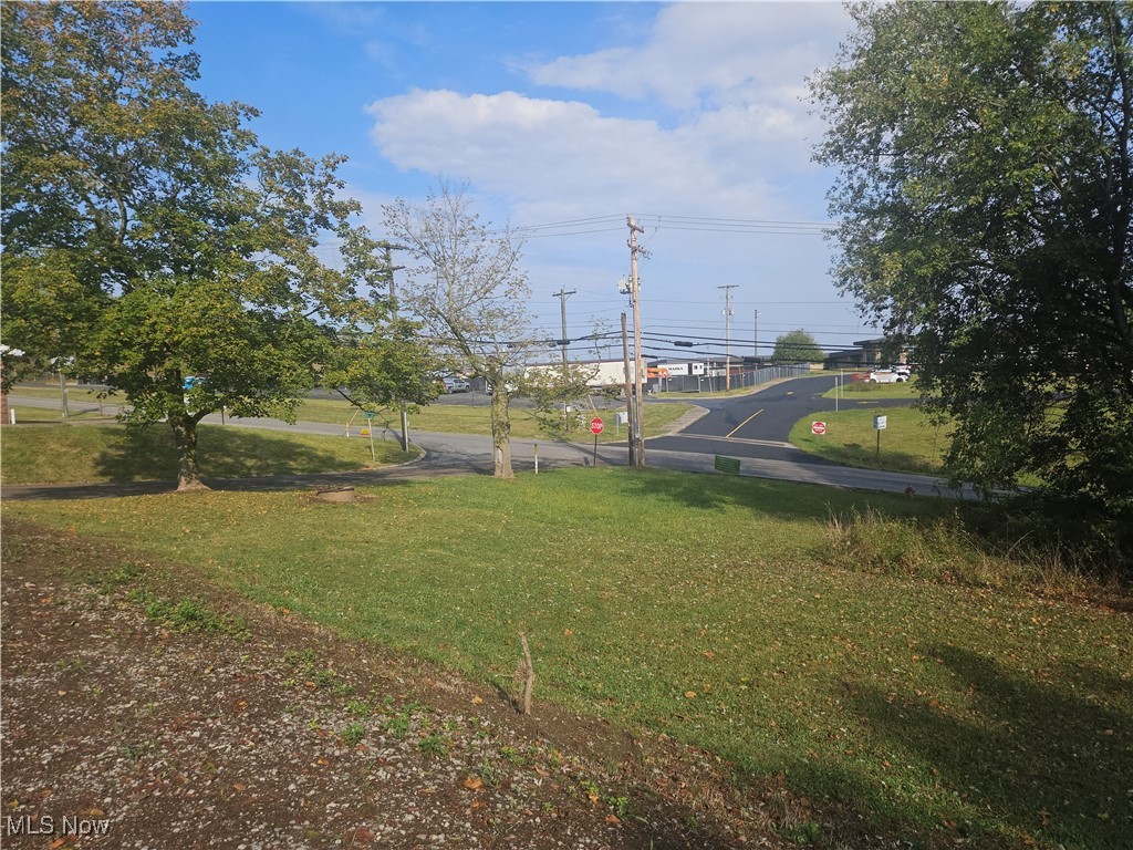This nearly half acre parcel sits directly across from Hills School, which is currently undergoing a large expansion that will bring even more energy, visibility, and growth to the area! With its prime corner lot location and excellent frontage, this property is bursting with potential. Imagine a coffee shop, food trucks, or food stands serving busy parents, teachers, students, and locals of all types throughout the day. Or perhaps a daycare, after school program, or community based business that complements the school’s growing presence. The land is mostly level, making it ideal for development, and the high traffic location ensures consistent exposure. Whether you’re an investor or an entrepreneur ready to create something special, this property offers the perfect canvas to bring your vision to life right in the path of progress!