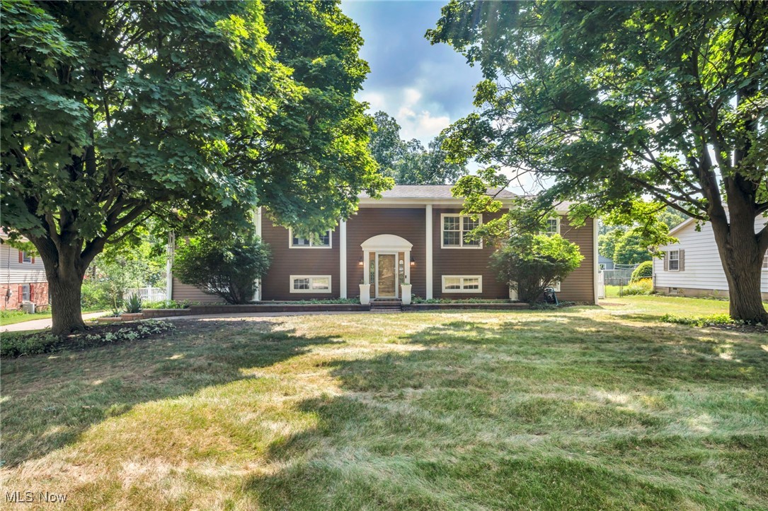Welcome to a home that’s been loved by the same family for over 30+ years—a rare find in the heart of one of Medina’s most charming, Hallmark-movie-style neighborhoods. With 4 bedrooms, 3 full baths, including a private en suite in the primary, this home offers a smart split-level layout perfect for everyday living and entertaining. The kitchen was beautifully remodeled in 2020, the home has newer flooring and carpet throughout. NEW ROOF & Electrical, Outside, perennials bloom all around, and the spacious lot invites gatherings of all kinds. The proximity to the schools and the square, makes this home and neighborhood one of the top locations! Schedule your showing today, you will be happy to did! Three bedrooms & 2 full bathrooms are on the upper level.  Walkout basement includes a full bath with walk in shower, & additional bedroom. Perfect opportunity to make it your own, or convert to an in-law suite.