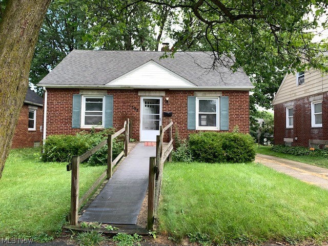 Any investors want to add to their inventory?  Bring some small upgrades and some good ol' elbow grease and bring this home back to glory again!  The all brick, cape cod  had its roof replaced about 14 year ago, and misc windows thru the years have been replaced, and currently has a handicap wheelchair ramp!  The upstairs carpet was dirty so seller removed it, thus it is down to the plywood and will need replaced.  For that reason, this home may not go FHA. The basement has glass block windows and a wonderful finished rec room, adding some additional living space.  This home will be a steal at 68k as the wood floors could use refinished and the kitchen could use some love. Note that the dishwasher does not work.  Upstairs bedroom to be heated via baseboard heat and window AC.  This is sold AS-IS as the seller will not have the extra funds for any repairs.