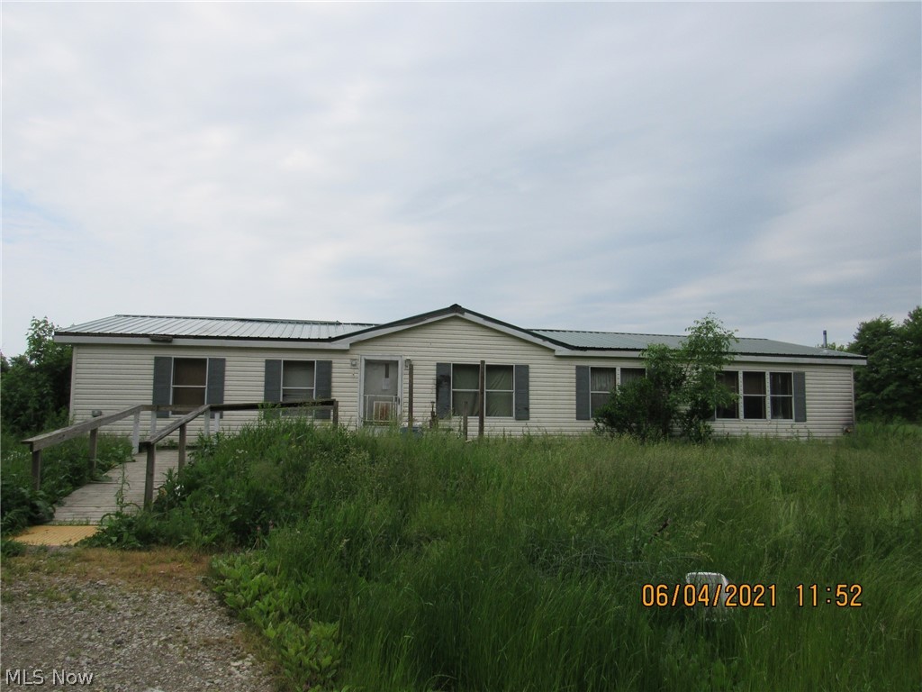 Bring you tool box and bring this property back to life. Offering over 1600 sq. ft. of living space on 2 quiet acres. About 10 miles to Lake Erie and approx. 5 miles to the PA State Game Lands #101.