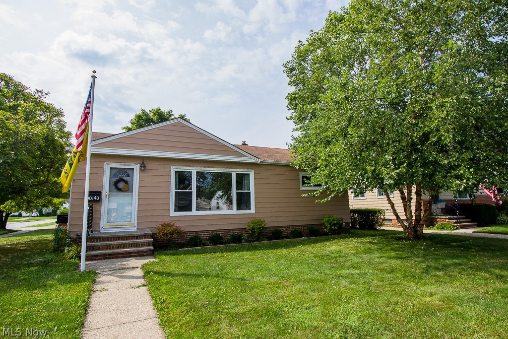 This cozy ranch is all new inside along with fresh paint on the exterior. Built in dining room table with banquette seating. The kitchen has granite counter tops on beautiful dark cabinets which provide the perfect contrast against the light gray flooring and stainless steel appliances. Newer carpet throughout, extra wide picture window in the living room allows loads of natural light pouring in. The bathroom is updated with a with a granite top vanity and all refinished surfaces. Check out the partially finished basement that has plenty of room for activities and extra storage. Enjoy summer evenings on the covered patio and 12 x 12 anchored awning that stays with the home. There is a 2.5 car garage, a large shed perfect for all your outdoor equipment. New full fenced yard 2020, New HVAC system 2020, house insulation, full house vent fan. Front yard flag pole. Point of sale has been ordered.