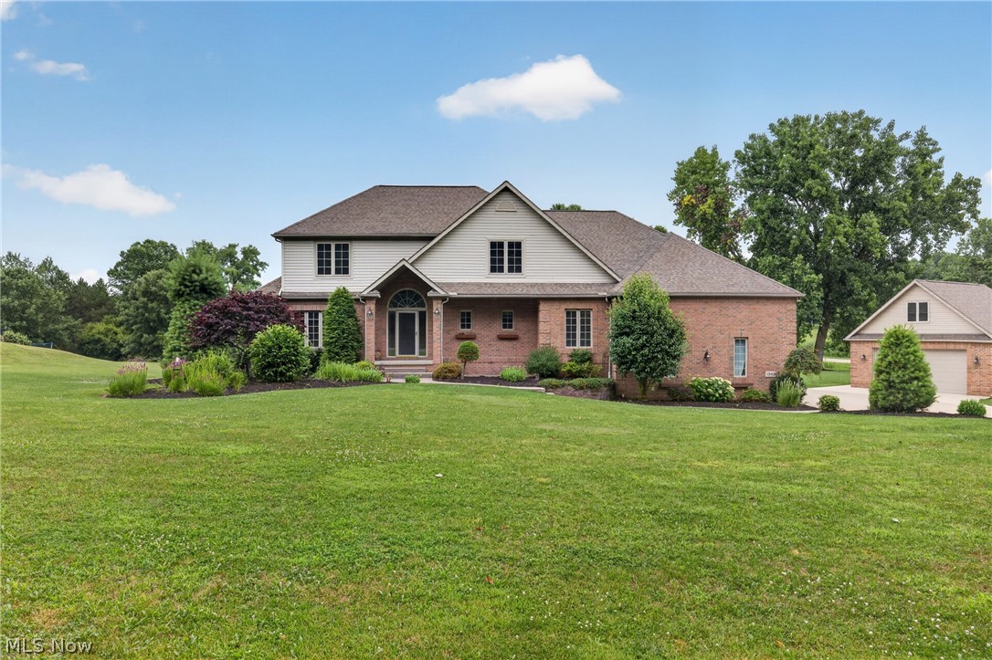 Look no further!  Your perfect dream home is located at 1343 Vermillion Dr., New Franklin.  This home is a stunning colonial which offers elegance and functionality with over 4,686 sq ft of living space. The property is set on more than 2 acres of private, tree lined seclusion.  Upon entering you will immediately be impressed by the maple hardwood flooring that seamlessly connects to the inviting living and dining areas.  The kitchen exudes elegance with the beautiful granite counter tops and sleek and practical title floors.  The spacious family room is perfect for relaxation.  The beautiful fireplaces throughout the home offer the ultimate cozy atmosphere to you, especially as the evenings get cooler.  A convenient first floor laundry room also has beautiful granite counters, fresh cabinets and tile flooring.  Upstairs, the owner's suite stands as an amazing tranquil retreat featuring a gas/woodburning fireplace, 2 expansive walk-in closets and an amazing and elaborate en-suite bathroom complete with soaking tub and dual shower heads.  There are three additional carpeted bedrooms which will be perfect for family and guests.  The fully equipped basement is perfect for entertaining with a rec room that includes a projector screen, kitchenette and a full bath.  (furniture in basement remains) Outside, the backyard is inviting with a 2 tier Trex deck, perfect for hosting gatherings alongside a patio featuring a built-in fire-pit and serene water accents.  The heated 4 car garage with 16' ceiling is perfect for adding a car lift.  A heated detached 2+ car garage with hoist completes this incredible home.

This corner lot is the closest thing to an oasis that you will find.  Other notable features include a lawn sprinkler system with its own separate water source and a whole house central vacuum system.  You have to check out this incredible home.  You will find your dream lifestyle.