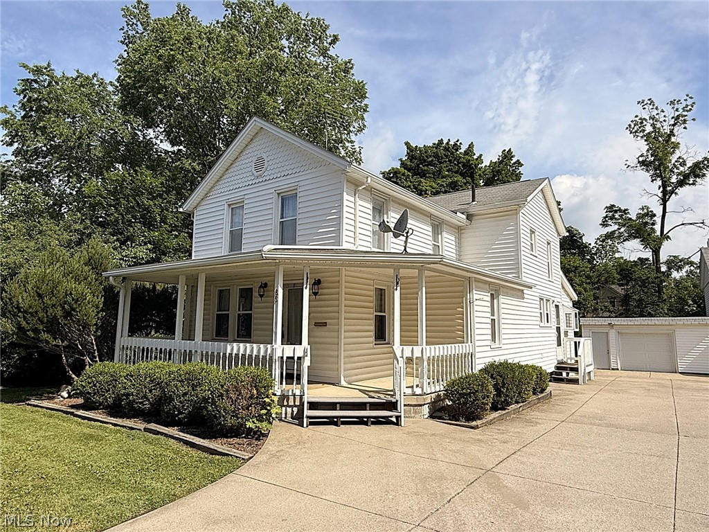 Rare Walkable Downtown Hudson Live/Work Opportunity! Located a few blocks from the heart of downtown Hudson, this beautifully updated front porch Colonial blends classic architectural charm with modern updates & offers exceptional flexibility for professional office, live/work, or residential use within Hudson’s Outer Village Residential (D3) district. Completely refreshed in 2024, the property offers over 2,300 sq ft with 4 BRs, 2 full BAs, and a highly adaptable floor plan ideal for a variety of professional/residential uses. The main level features 2 first-floor offices or bedrooms and full bath, creating an ideal setup for reception, client meeting rooms, consulting space, or convenient one-floor living. The updated kitchen offers excellent cabinet & counter space, granite counters, modern backsplash, and all appliances included. A large, light-filled eating area can easily serve as a conference room, collaboration space, or break area. Major improvements include new luxury vinyl flooring & carpet, fresh paint, lighting fixtures, ceiling fans, landscaping, plumbing fixtures, a newer hot water tank, and a new furnace installed in 2025. A spacious first-floor laundry adds additional functionality. The 2nd floor includes two additional offices or bedrooms with beautiful wood floors, full bath, and versatile flex room that can serve as additional office space, meeting room, file storage, or lounge area. Outdoor amenities include a covered front porch and private patio with water feature, along with generous yard space and ample off-street parking. Located within easy walking distance to Hudson’s restaurants, shops, parks, and community amenities, the property is ideal for attorneys, accountants, therapists, consultants, boutique professional offices, or live/work entrepreneurs seeking a unique and highly visible location. Move-in ready and extensively updated, this is a rare opportunity to own a flexible property in one of Hudson’s most desirable downtown locations.