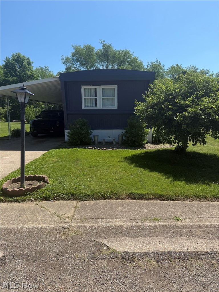 Explore this mobile home located at 54 Thomas Blvd NW in the heart of Massillon, OH. This residence boasts a unique opportunity for those seeking a cozy and manageable living space. With its open layout, the interior provides a versatile canvas for personalization and comfort. The property is situated in a location that allows for easy access to the amenities and conveniences of Massillon. Whether you're looking to downsize or find a more compact living solution, this mobile home presents a wonderful chance to create a space tailored to your needs. The surrounding area feels like a sense of community while also providing the privacy that comes with living in a mobile home setting. This property is a testament to comfortable and adaptable living, ready to welcome you to your new chapter.