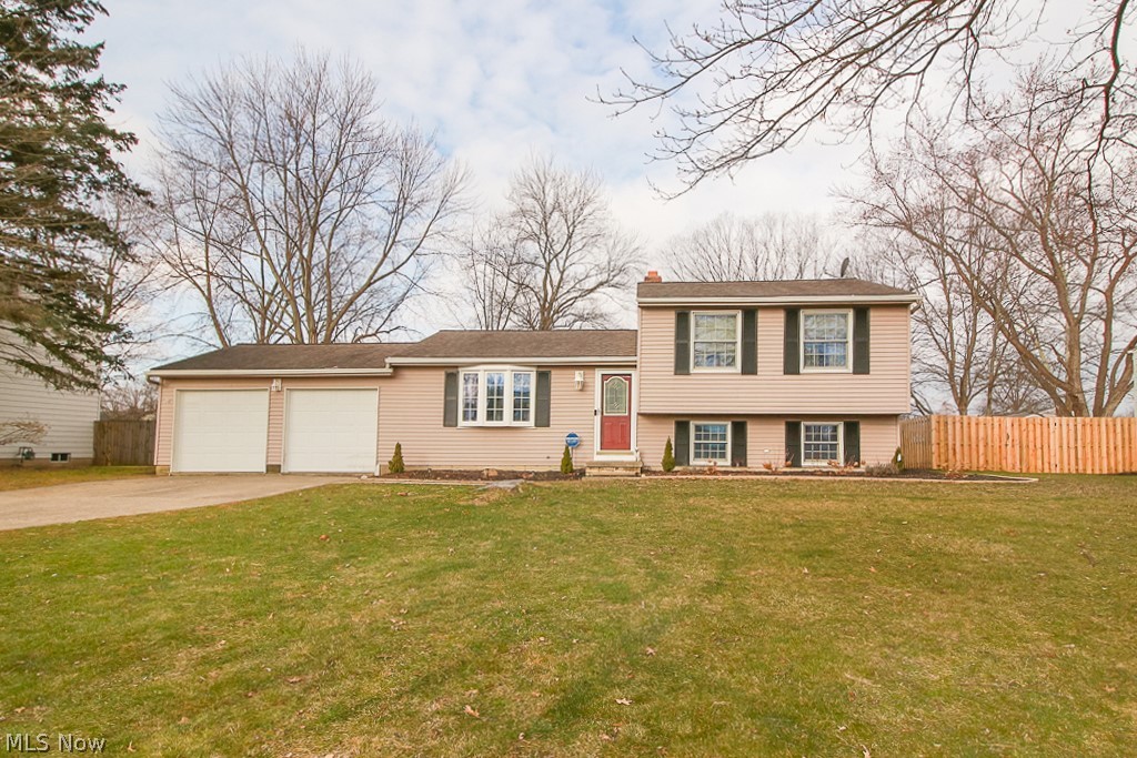 Welcome Home to this wonderfully maintained 4 level split in the highly sought after city of Strongsviille. This home offers newer laminate flooring throughout the kitchen and main living room. The whole interior of the house has had a fresh coat of paint. Both full bathrooms were fully remodeled in 2021 along with the laundry room. The Second living room really adds to the space of this home for family and friends to gather. All new updated landscaping in 2021. Walk out on the back deck to a very well maintained above ground pool with a new pool heater installed in 2021 and a new liner installed in 2019. All appliances stay except the fridge and washer and dryer. Don't miss out on this one. Open House Saturday March 5th 12-2