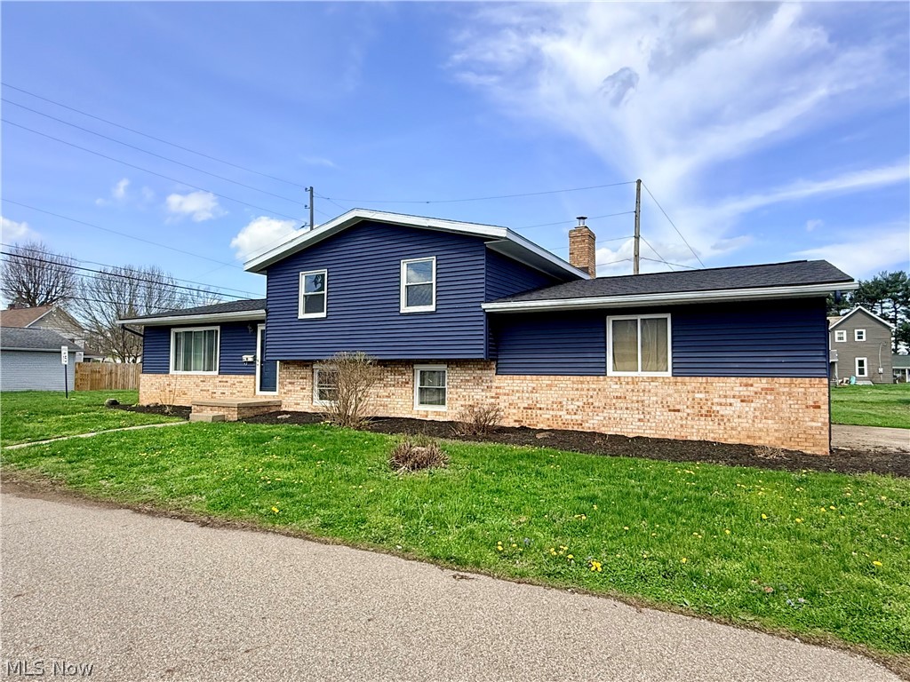 Well maintained 3 bed, 2 bath split level property with solid updates, yet room to make it your own. Freshly painted exterior, newer A/C and roof, and vinyl windows offer peace of mind. The functional layout offers comfortable living spaces with potential to personalize over time. The large family room has a wood burning fireplace and the dining area features a sliding door leading out to a covered back patio and nice yard - perfect for entertaining. The attached 2 stall garage and paved driveway provide ample parking and a shed out back offers additional storage. Schedule your private viewing today!