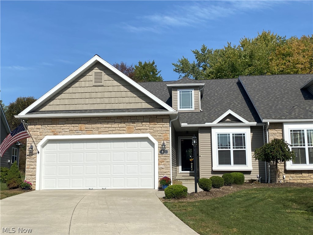 Better than new construction with many recent top-of-the-line improvements you will appreciate. Cul-de-sac area with front pond view plus relaxing wooded view from 4 season sunroom. Open floor plan from large kitchen into spacious great room and sunroom. Quiet first floor master with private full bath, tiled shower, double sinks, walk-in closet plus handy laundry full of new cabinetry.  Office/bedroom right off 4x15 hallway near beautiful full-tiled guest bath.  Neutral decor, modern white trim, new custom blinds, knock-down vaulted ceilings, attractive stone corner gas/electric fireplace with mirrored shelf, additional solar tubes and track lighting features are nice.  Ceramic tile throughout foyer, kitchen, and all bathrooms with new Premier laminate flooring in great room and sunroom plus Marquis vinyl tile steps to upper loft. Upstairs offers fun loft area plus a private 3rd bedroom complete with full bath and walk-in closet.  Stainless steel appliances include refrigerator, stove,