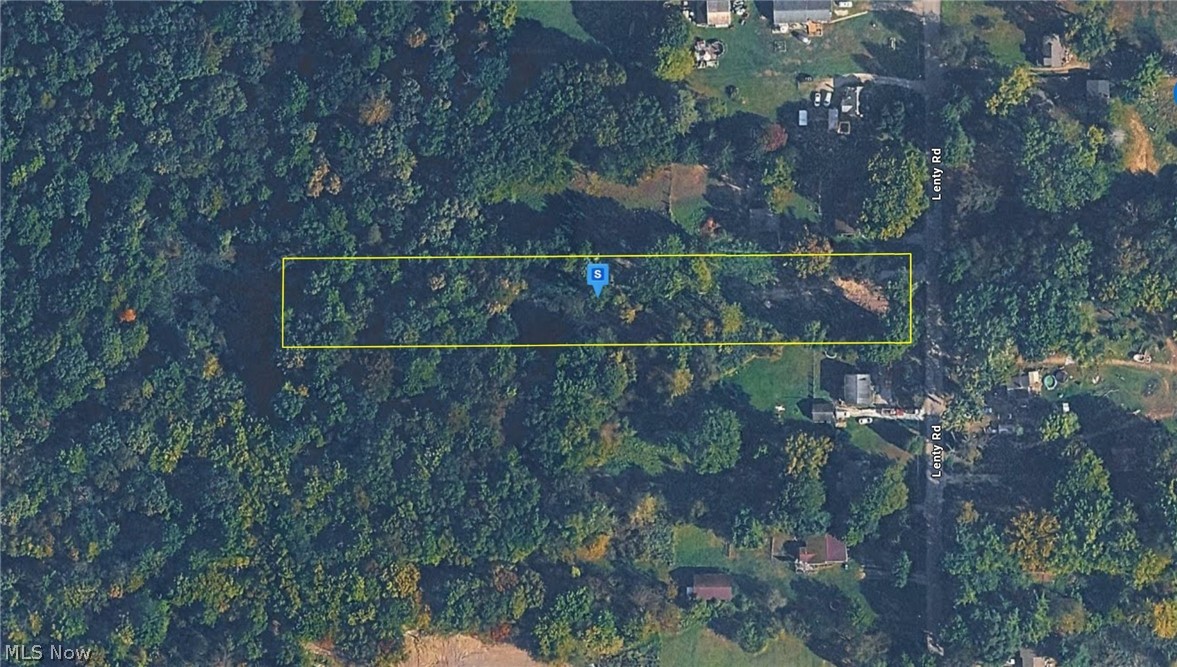 Located in Coventry Township, Summit County, Ohio, this 1.62-acre parcel offers a flat, wooded setting that provides both privacy and a natural residential backdrop. Situated in a quiet established area with nearby homes and local road access, the neighborhood blends rural character with convenient proximity to Barberton and surrounding Summit County amenities. With no HOA restrictions, the property allows flexibility for future development, whether for a custom home or long-term investment. The level terrain and mature tree coverage create a versatile site with a peaceful, secluded feel while still being close to everyday conveniences.