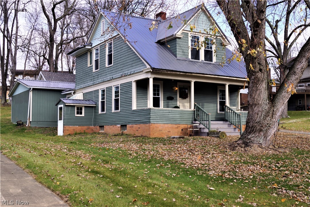 Immediate Possession and Move-in-Ready on this adorable home in the "Heart of Minerva" on "Hart Ave."!
This 3 bedroom, 1-1/2 bath home has many  very nice renovations! Newer metal roof and windows on house and garage, newer overhead garage door. House is all freshly painted inside and out. All newer flooring throughout. Beautiful new kitchen within the last year. Large formal dining room. First floor utility/laundry room doesn't currently have washer/dryer hook up but would be very easy to do. 1/2 bath on the main level. Beautiful wood staircase leads to 3 bedrooms and full bath upstairs. Full basement with high efficiency gas furnace. All new plumbing within the last year. 24x30 detached garage with electric. Situated on 2 parcels.