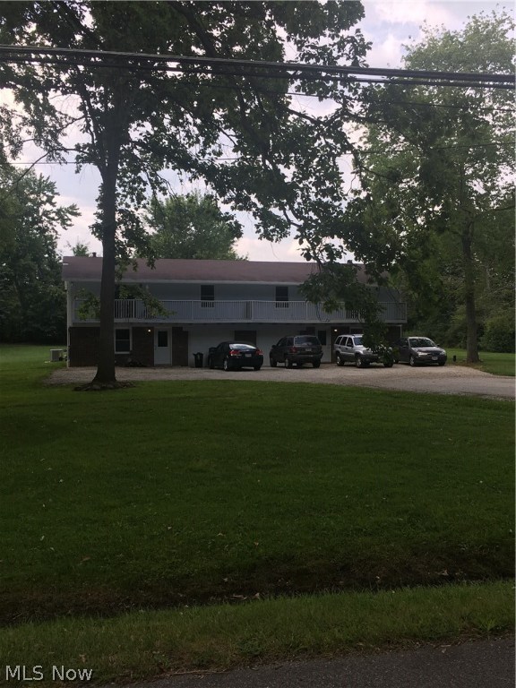 Nice opportunity in a great location.  This well-cared-for two (2) unit offers nice size rooms, separate utilities, attached middle garages with lots of parking spaces on a level lot. Some of the updates in last two years include vinyl windows, furnaces, light fixtures, central air units, hot water tanks, insulated garage doors, screen doors, slider doors, carpeting, vinyl flooring, refrigerators, CO and smoke detectors hard-wired in, downspout lines and drains, and freshly painted throughout. Property has been converted to forced air gas heat.  One of the sheds is brand new.  Room measurements: Living 12x17, kitchen 15x12, master bedroom 11x14, 2nd bedroom 11x10, family room 11x18, and utility/laundry 14x19 each side. Nice enough to easily live in one side and immediately rent out the other. Appliances include 2 refrigerators, 2 stoves, 2 dishwashers, 2 central air units, 1 water softener, and 1 sump pump.  Brick, block and cedar sided exterior. Upper wood deck measures 69' x 4' with