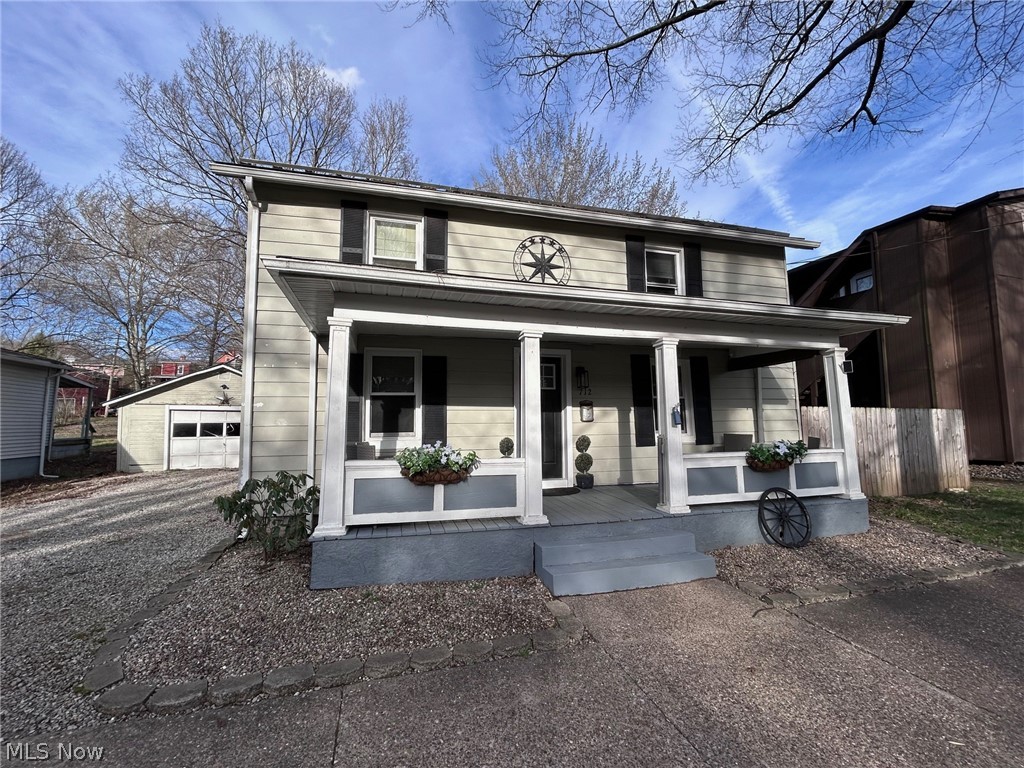 BACK ON MARKET DUE TO FINANCING ONLY! If you’ve been searching for a home with historic charm but want the major interior updates already completed, this 1890 beauty is ready to welcome you home. Step inside and you’ll immediately appreciate the character paired with thoughtful interior renovations. Laminate flooring flows throughout, creating a clean, cohesive feel. The fully remodeled kitchen is a standout feature, offering granite countertops, updated cabinetry, and a spacious walk-in pantry — ideal for both everyday living and entertaining. The main-floor bathroom has been completely renovated and smartly designed to include a convenient laundry combination. Upstairs, a second bathroom already has fixtures in place and simply awaits completion — providing a great opportunity to add additional value over time. A newly constructed staircase leads to the second level, where the primary bedroom showcases exposed ceiling beams for added warmth and architectural charm. You’ll also appreciate the abundant attic storage — a rare bonus in many older homes. Major improvements include a newer metal roof and replacement windows, offering peace of mind on key components. Situated on a double lot, the property provides an abundantly large backyard enclosed by a newer wood privacy fence — perfect for pets, play, gardening, or creating your own outdoor oasis. The oversized single-car garage offers off-street parking, and alley access allows convenient entry to the backyard. Covered front and back porches add inviting outdoor living spaces to enjoy morning coffee or evening relaxation. While most updates have been focused on the interior, the exterior offers an opportunity for cosmetic improvements, allowing a homeowner to build equity and truly make this property their own. A wonderful blend of historic charm, modernized interior spaces, and outdoor potential — ready for its next chapter.